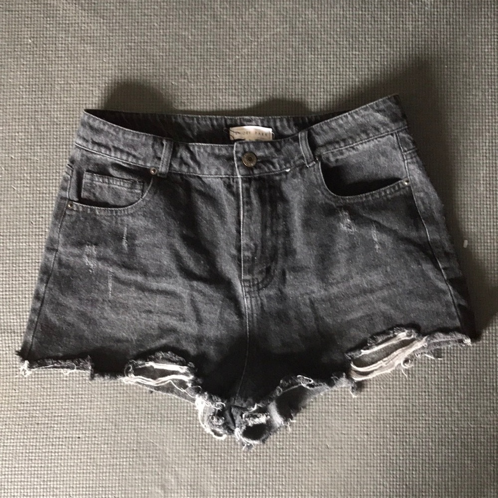 Black Jean shorts with rips